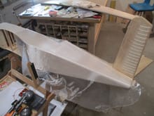 knowing that I have enough cloth now, I cut a section to complete the rear of the fuselage.