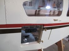 Behind the cargo bay door are where all of the plane's switches and fuel dot are hidden.  