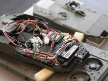 The battery placed in the turret per Tamiya Instructions will warp it over time; result, turret sags and rubs on the tank deck. Also, no more messing with turret wires during battery swaps.