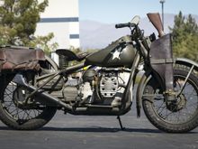 Rare, Harley XA model from WWII.
Would be right at home in Texas with the leather bags and loaded Winchester 73 in the scabbard!

   Or maybe even in Dave's driveway;)