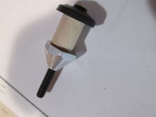 I hope this is a little more clear as to how the hard-point is clamped between the upper and lower portion of the horn.  The dowel is glued and does not float between the two...