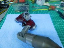 Piece missing from rear of muffler, does not change when run.