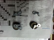 How do I get the wheels off of the two broken suspension arm pieces (I've got replacements for them)?