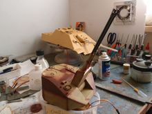 Dark yellow on the parts not needing fixed then filler and hull red again