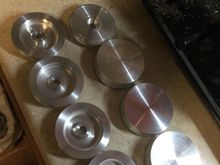 MLG or NLG rims in early stages of being turned on the lathe. Not even sure which is which right now. :-)