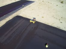 Complete surface rolled with a 5 ton steel roller.