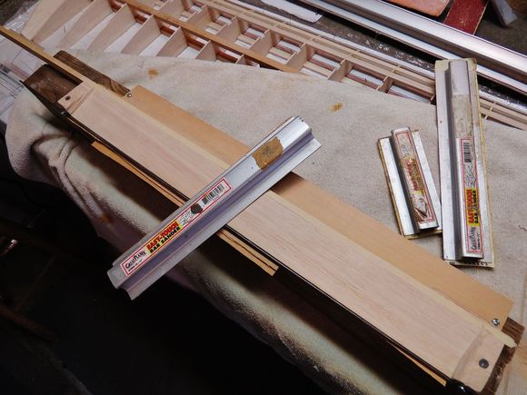 Just about done here and ready for 100 - 180 grit finishing strokes. That's the vaneer shims  that you see under the balsa block.