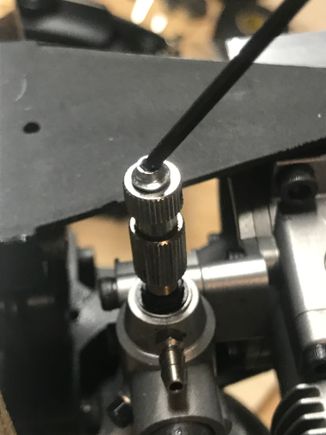 A cut-down, socket head servo screw fixed at the high speed needle. 