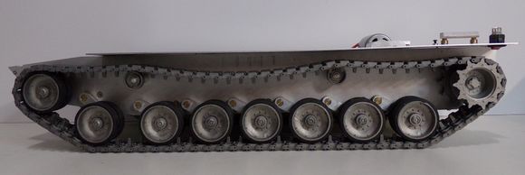 Side view - all metal road wheels, idler, sprockets, and return rollers.  They seem to have bearings installed.