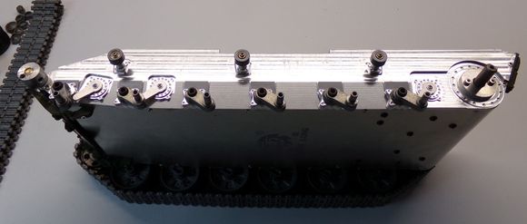 The sides have CNC machined detail.  Includes adjustable idler/tensioner.