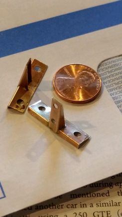 Cut rectangular brass tube and silver solder = landing light mounting brackets