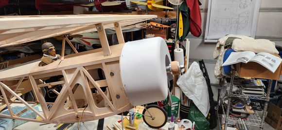 cowl mounted,  throttle servo mounted next to fuel tank