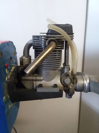 Here is the right side of the engine with exhaust pipe and needle valve shown.