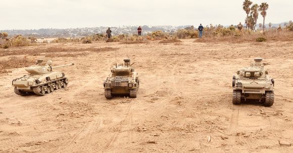 Long range gunnery a forte of the IDF.  The folks in the background are just some of the Arab tanks facing the three M50/51s in this fight. 
