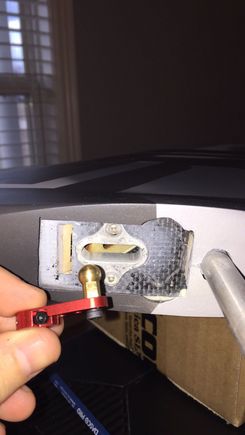 Brass ball and what looks like aluminum insert.