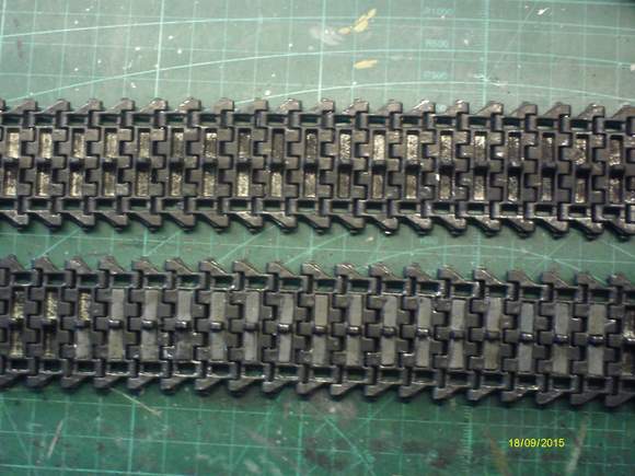 Chief tracks with neoprene rubber blocks to fill the hollows on the back - lower track, upper track with unfilled hollows