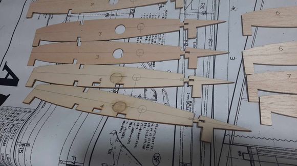 Original servo extension routing holes were glued back and eliminated and re routed in a different location
