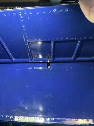 Slot the flap and use slot to locate control opening.