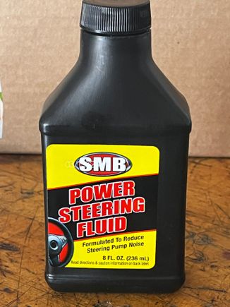 This bottle of power steering fluid fits the needs well. Cost is $1.25 at the stores we called "Dollar Stores " pre 2021:;

    Works great, priced right.