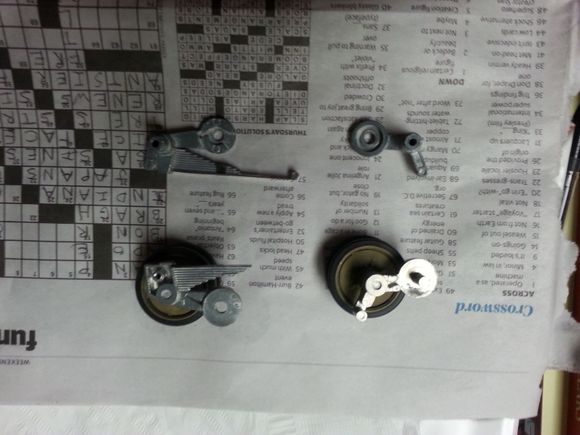 How do I get the wheels off of the two broken suspension arm pieces (I've got replacements for them)?