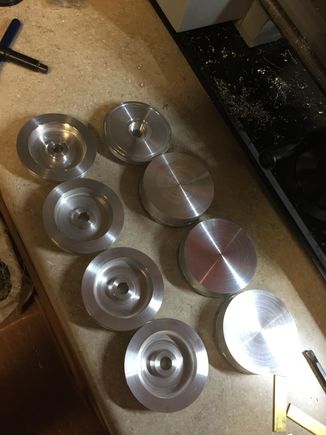 MLG or NLG rims in early stages of being turned on the lathe. Not even sure which is which right now. :-)