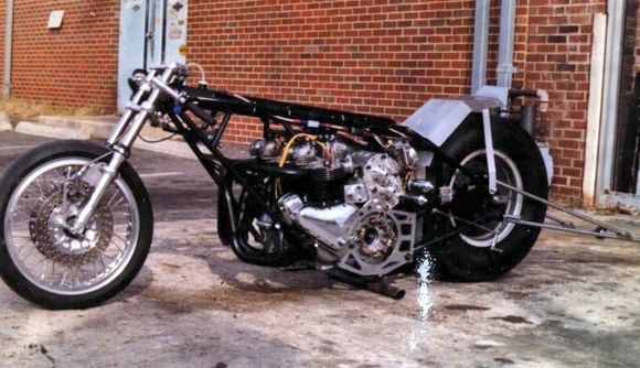 Side by side, twin engined Triumph drag bike. Baby GMC blower with Hilborn fuel injection. Twin , forged Moldex cranks, Carillo rods. Heavily modded Alf Hagon frame. 