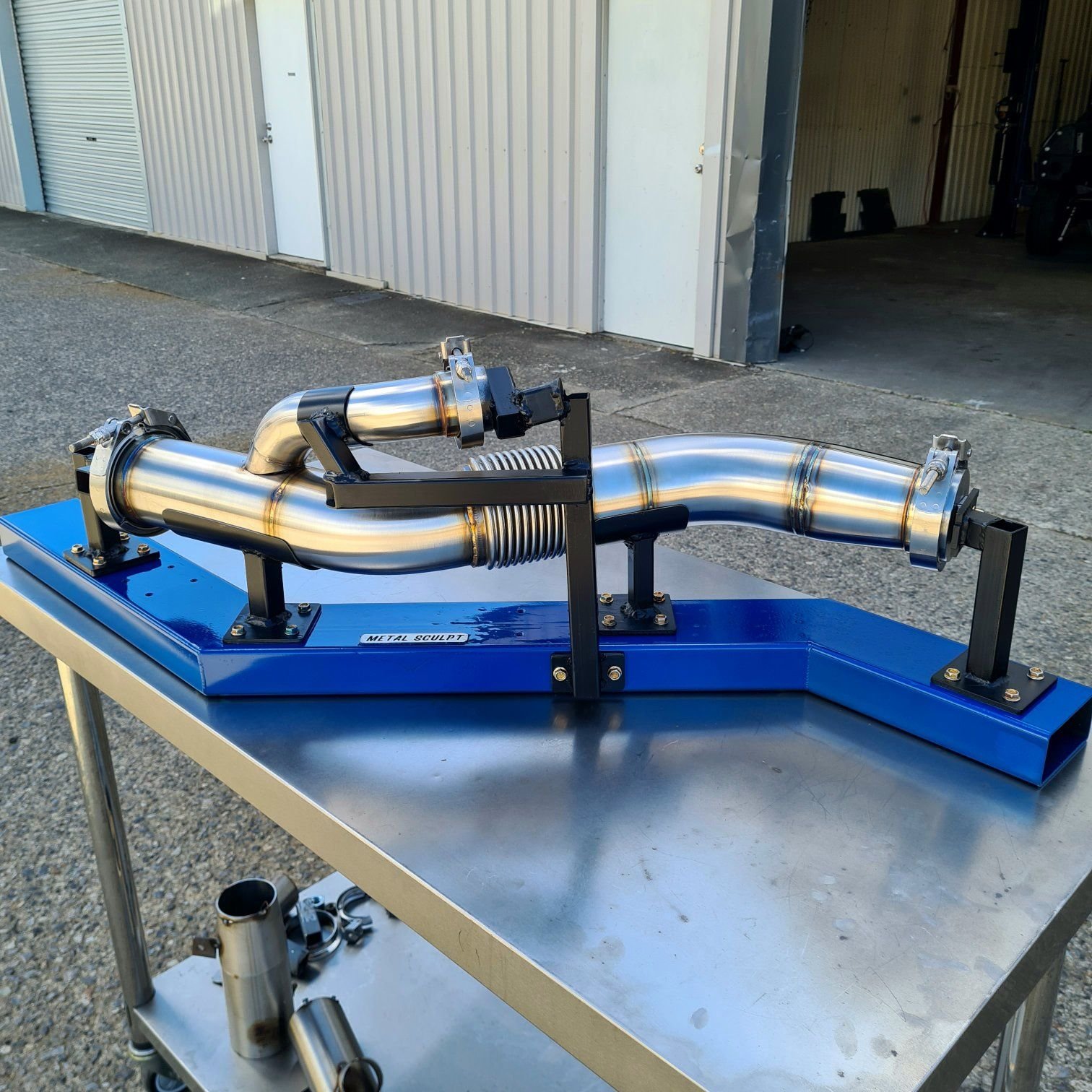 Downpipe with recirculated wastegate routing