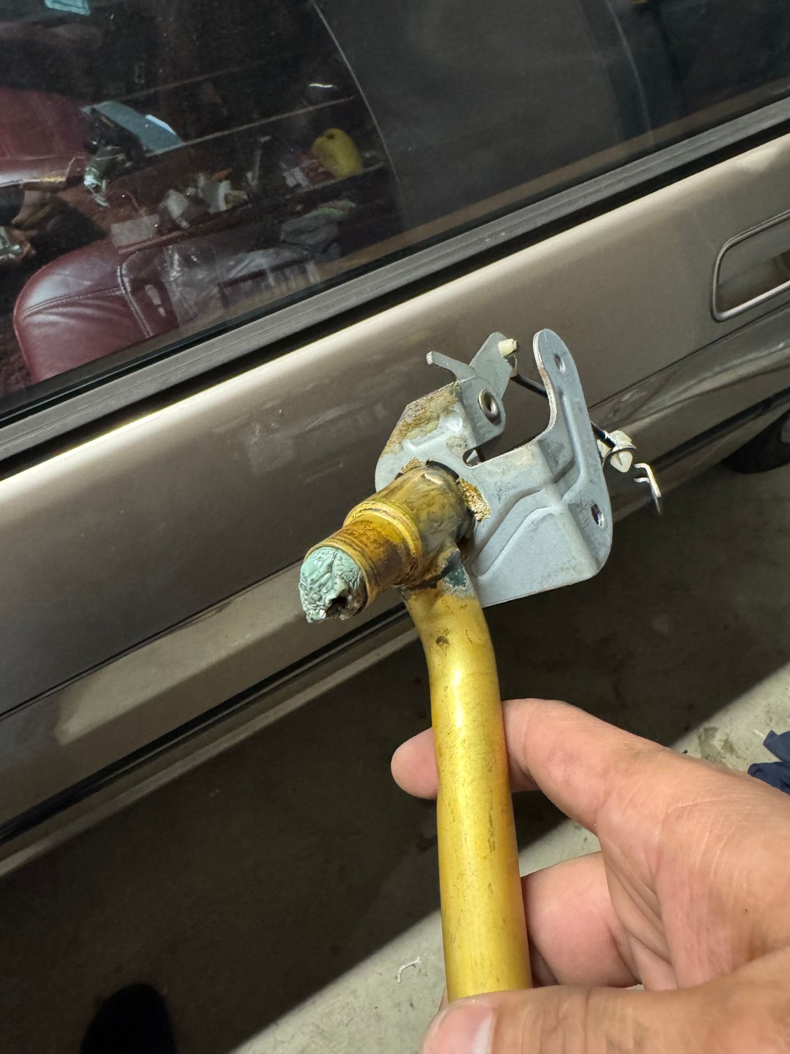 What is this? It was hard like plastic I removed it could this have been the issue? Radiator fluid was leaking from the top of the valve.