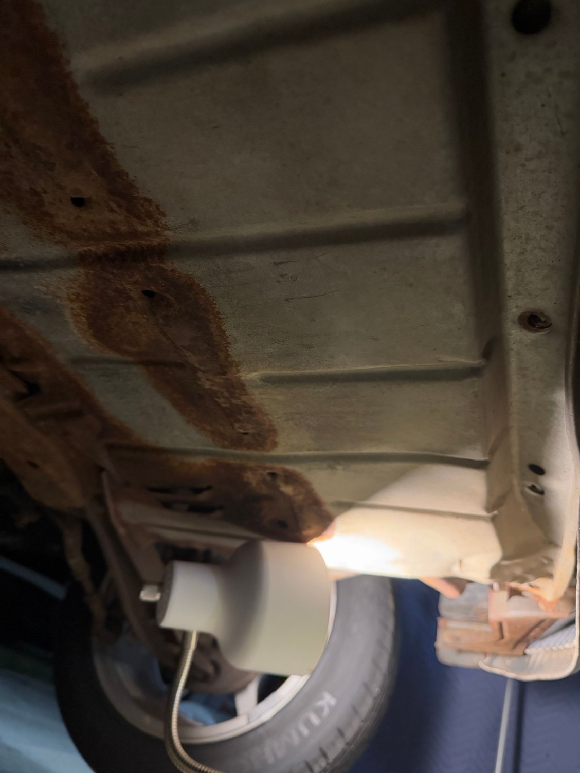 Jack the car up and remove the under tray (clean your oil pain and all the dirt while your under here)