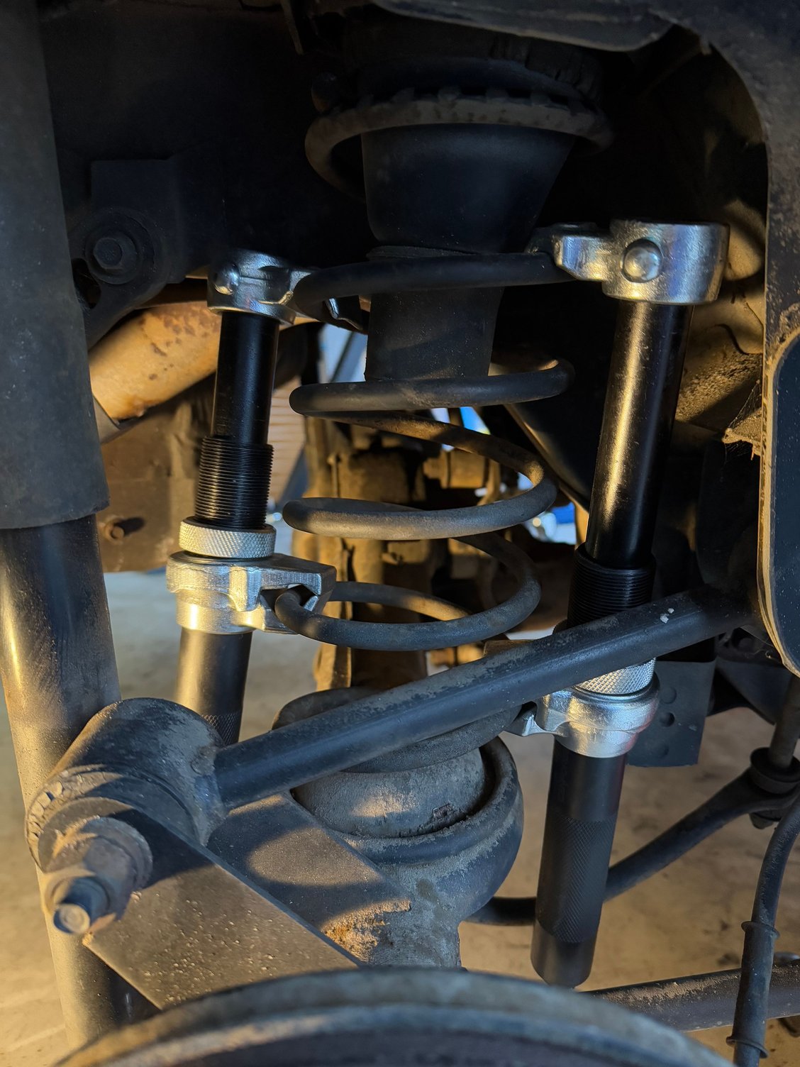 I needed to use spring compressors to get these out, surprisingly still springy.