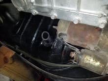 I drilled a hole in the side of the transmission tunnel and put a grommet, and ran a 6 foot piece of 3/4 in. Heater hose through it ,and then ran the power wire tjeough that, dont want to take any chances of something wearing a hole in the insulation of the wire