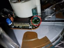 I suspect this capacitor, C1, was previously replaced.  What are the values stamped on the capacitor?  It should be 1uF @ 50V.