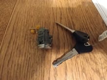 This is the other lock assembly from the eBay Mazda 323 lock set.  This is not an OEM part as the keys are generic.  From the pictures I've seen of the OEM ones, the included keys include a tag that is presumably the key code.