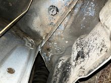 I have no idea where the common rust spots are but this is behind the rear inner fender 