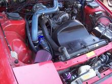 Engine shot with old school greddy FMIC and wacky piping.