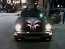 RX7 WITH PR SKULL ON HOOD