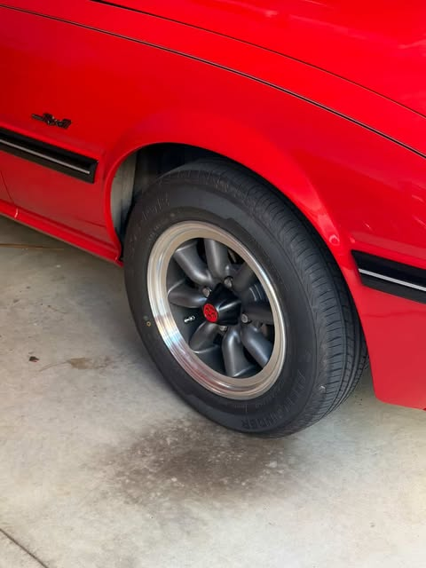 I forgot to bring the centre caps when we picked up the car.  They were fitted in our garage.