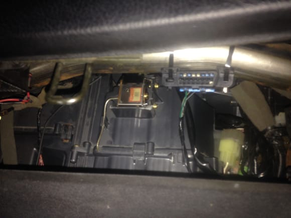 Obd port mounted behind the glove box... still easily accesible