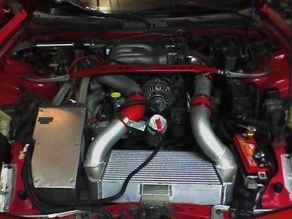 Engine Setup

322whp 99spec turbos streetported
Rotary Extreme V-mount
tuned by Steve Kan