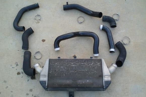 The $107 FMIC kit. Gotta love those aluminum &quot;radiator hoses&quot; at the junk yard...
