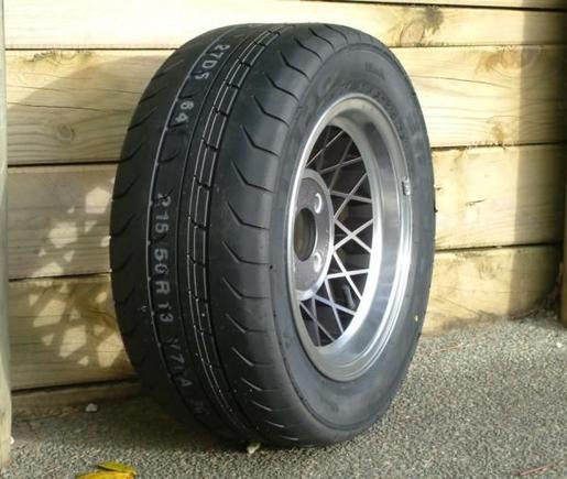 6 Wrapped!! Tyres on ... just in the process of procuring shoulder bolt sets for these wheels. No-one makes them any more so will have to Loctite shoulder lugs onto studs to make bolts.