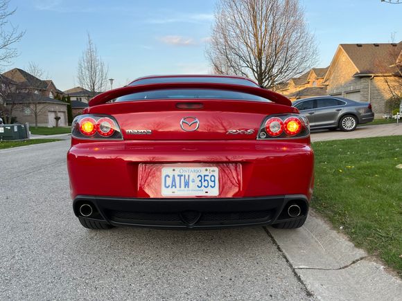 2004 Mazda RX-8 with aftermarket tail lights.