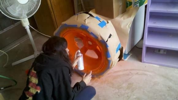 my wife painting wheels