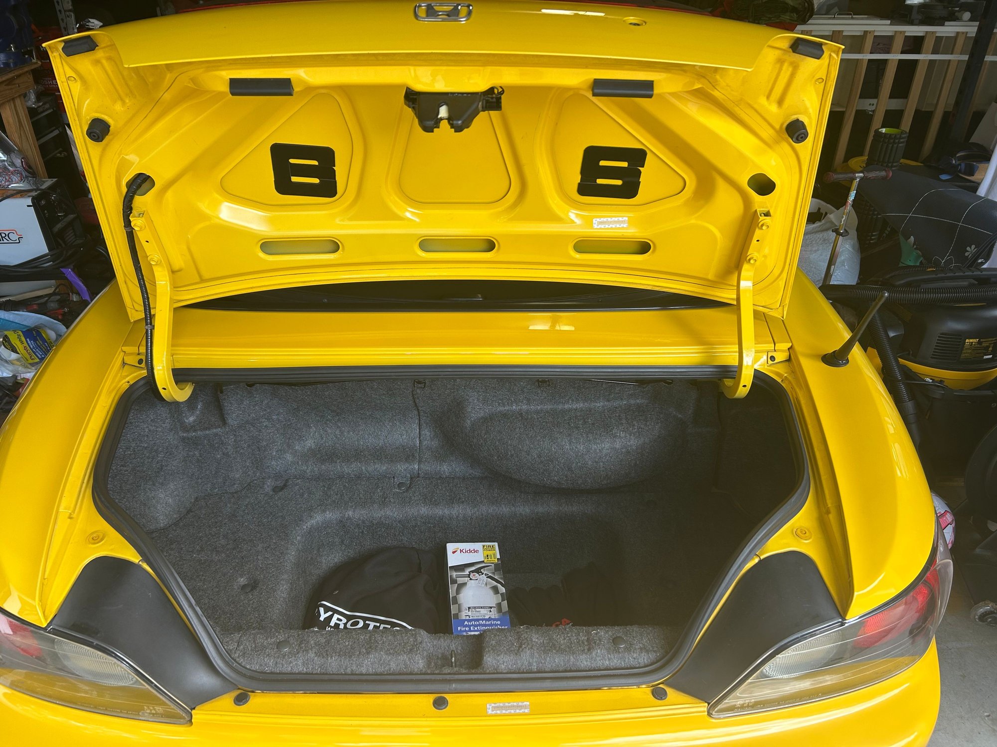 I was thinking maybe you could mount base plates in the seams, inside the trunk…