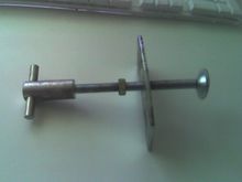 Front piston retractor