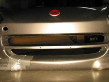 Distinto Harsh Light Front Full On.jpg
