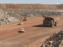 1303234680 huge truck goes over smaller truck
