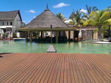 hotel pool thatched roofs