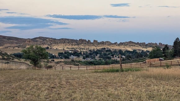 ^7-10-2024.  No lush trees here.  The ridge in the distance is called "Devil's Backbone".  I like that I can see it from my house.  