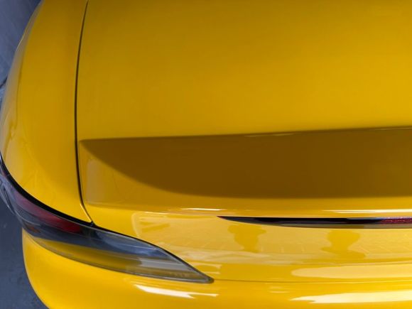 Keep in mind the spoiler is plastic and the trunk is aluminum so there will be variation in the paint even from the factory. 